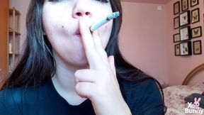 Bare lips smoking cigarette