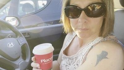 Hitchhiker MILF grabs driver's cock and blows him in the car