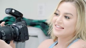 Handsome guy and busty girl in photo shoot