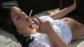 Sultry Brunette Smokes