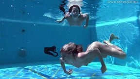 ”Jessica & Lindsay swim naked in the pool”