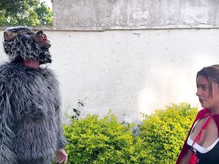 Little Red Riding Hood lost a fruit from her basket and is looking for it in the wolf's panties.