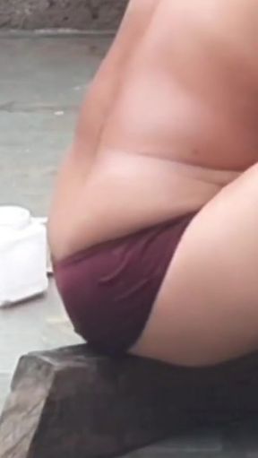 The desi sister-in-law of the village opened the drenched saree and took a bath in the open bathroom.   Clip 1