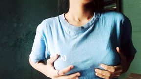 Lonely girl looking at her tits