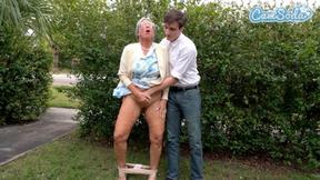 ”Gilf Squirts in Public: Stranger's Thick Orgasm”