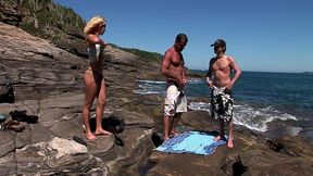 they take a beautiful blonde to the beach to fuck her with a double penetration