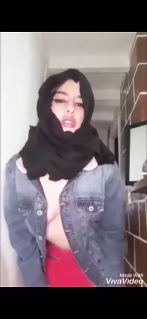 Arab wearing burqa and kneeling for her master