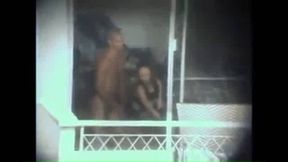 Hot brunette Asian girlfriend with black panties and a ponytail convinced to fuck doggystyle with open balcony door for all of us to see (real voyeur)